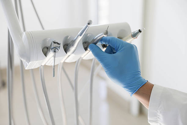 Professional Tooth Extraction technician working in Kinsley, KS